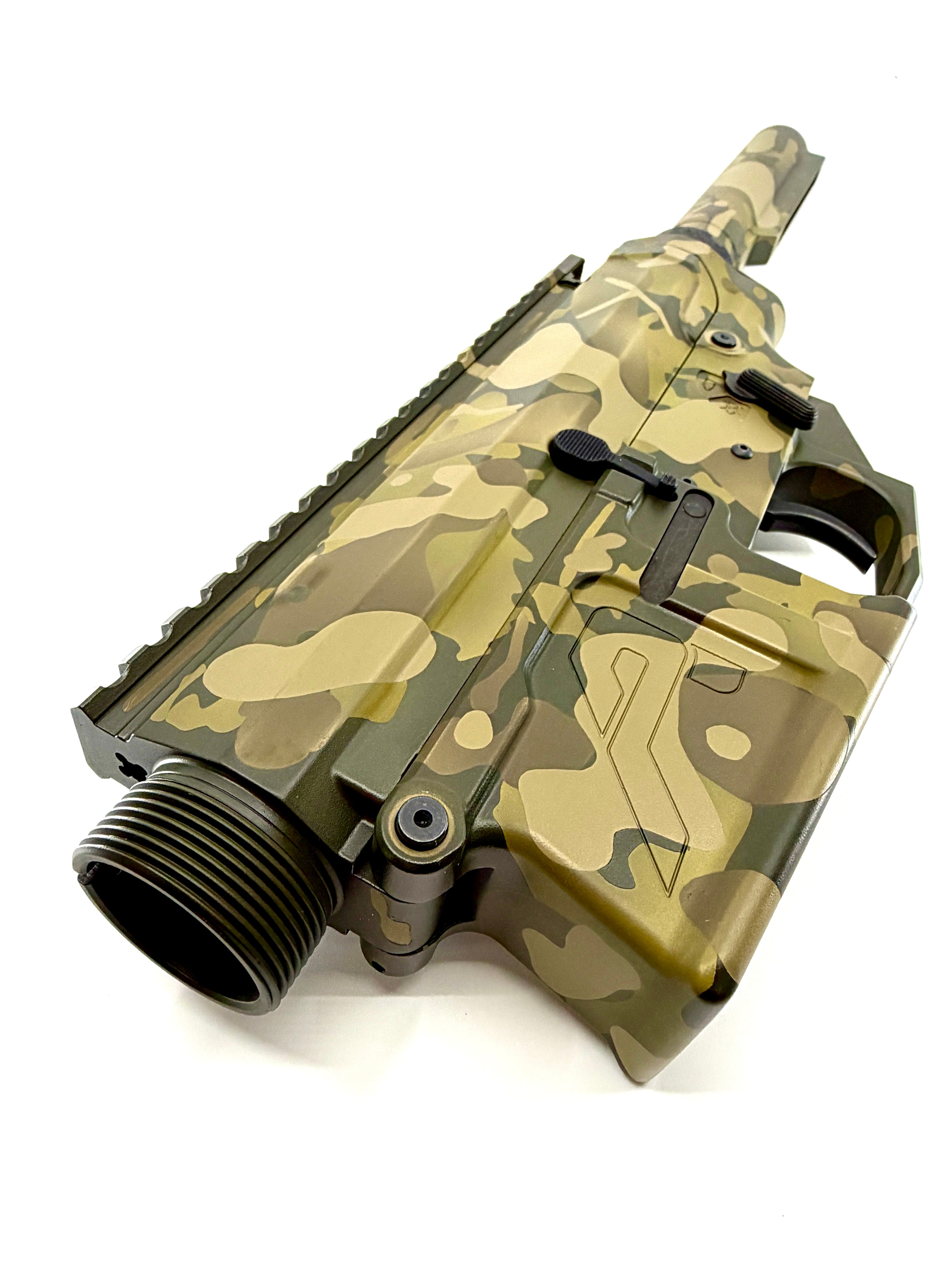Custom camo Cerakote AR lower receiver — tan, olive, and dark earth pattern on Aero Precision lower by Northwoods Firearms