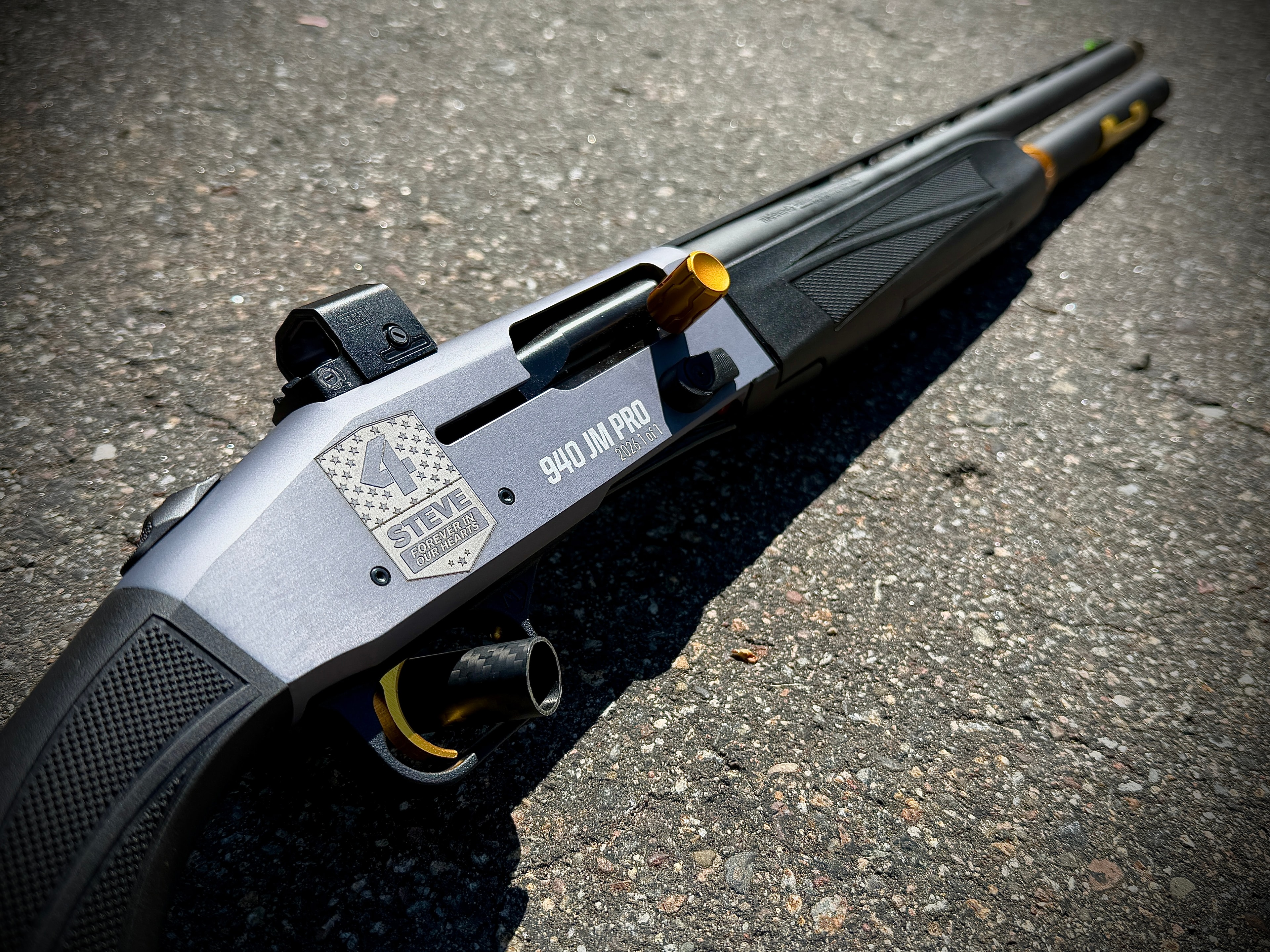 Laser-engraved Mossberg 940 JM Pro with custom memorial tribute badge — For Steve, Forever in Our Hearts — by Northwoods Firearms