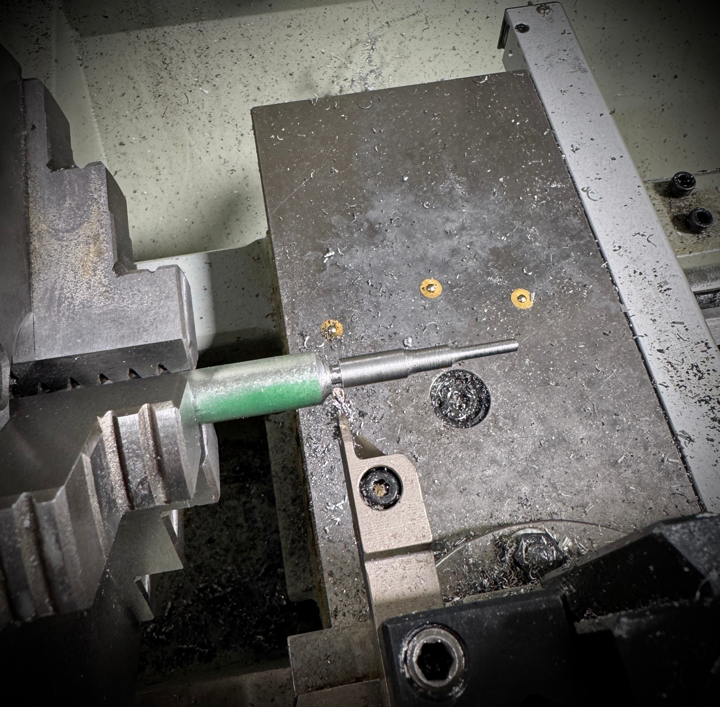 Barrel threading setup on the gunsmith bench at Northwoods Firearms — threading jig, Milwaukee vise, and precision tooling